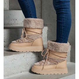 Botas de neve femininas com isolamento bege e decoradas com pele 1