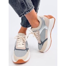 Calçados esportivos femininos com meia cinza 1