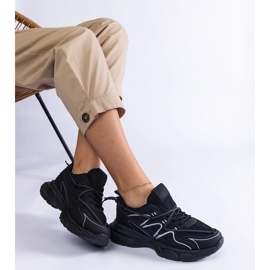 Tênis de mulheres negras em uma sola enorme preto 2