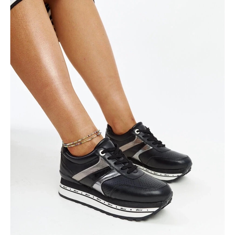 Tênis negros na sola alta de Mehari preto 1