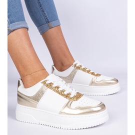 Tênis femininos dourados em uma sola grossa decorada com glitter 2