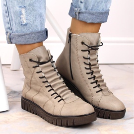Botas femininas confortáveis com isolamento bege Rieker Y3420-60 1 Botas femininas confortáveis com isolamento bege Rieker Y3420-60 1