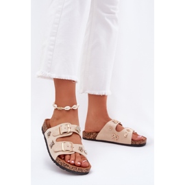 Flipers femininos em uma sola de cortiça com fivelas e peças bege 2