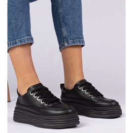 Tênis de mulheres negras em uma sola alta preto 1