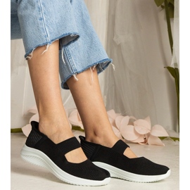 Tênis de mulheres negras em uma sola pressionada preto 1