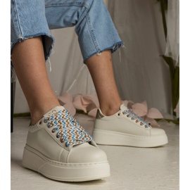 Tênis femininos bege com laço maciço 2