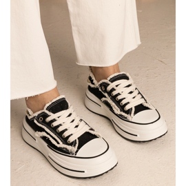 Tênis de mulheres negras em uma sola alta preto 1