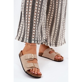 Flips femininos em uma plataforma de cortiça com grampos dourados bege 2 Flips femininos em uma plataforma de cortiça com grampos dourados bege 2