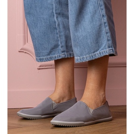 Tênis cinzentos de mulheres cinza 1