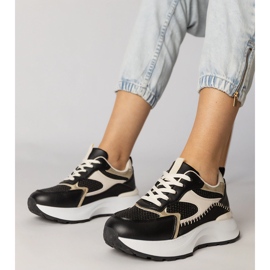 Tênis esportivos negros com uma inserção trançada preto 1