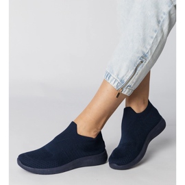 Tênis esportivos azuis da marinha com um superior em socas azul 1