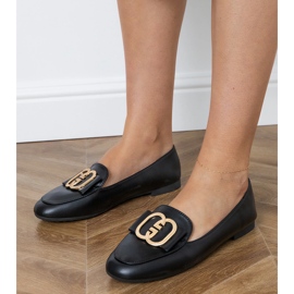 Mocas de mulheres negras com uma decoração de ouro preto 1