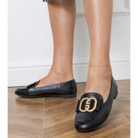 Mocas de mulheres negras com uma decoração de ouro preto 2