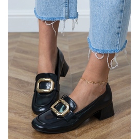 Sapatos de bleos -lombares de mulheres negras com uma decoração de ouro preto 2 Sapatos de bleos -lombares de mulheres negras com uma decoração de ouro preto 2