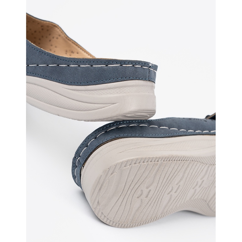 Seastar Flip de mulheres da Marinha com uma flor decorativa azul 1