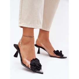 Sandálias transparentes em um salto alto com uma flor decorativa preta preto 2