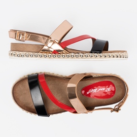 Sandálias femininas com uma sola decorada dourado 1