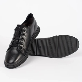 Sapatos de homens negros isolados com pêlo preto 2 Sapatos de homens negros isolados com pêlo preto 2