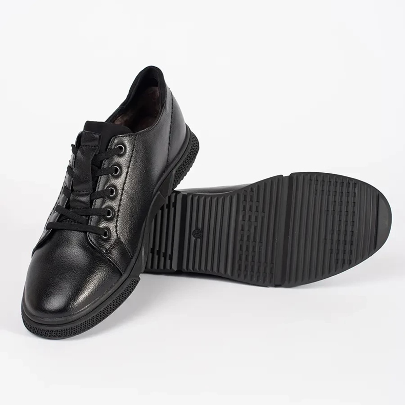 Sapatos de homens negros isolados com pêlo preto 2 Sapatos de homens negros isolados com pêlo preto 2