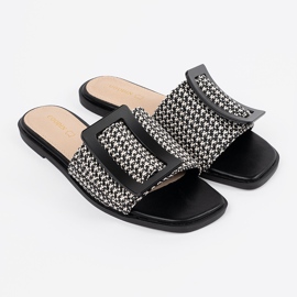 Goodin Tedeed abas em uma sola plana em preto e branco 2