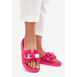 Flip feminino com um arco e um broche dourado fúcsia rosa 1