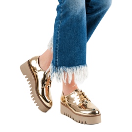 Corina Golden Brogues com um protetor dourado 1 Corina Golden Brogues com um protetor dourado 1