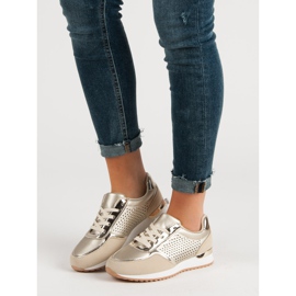 Calçados Esportivos Dourados 1