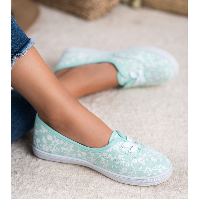 Tênis com padrão VICES branco verde 1