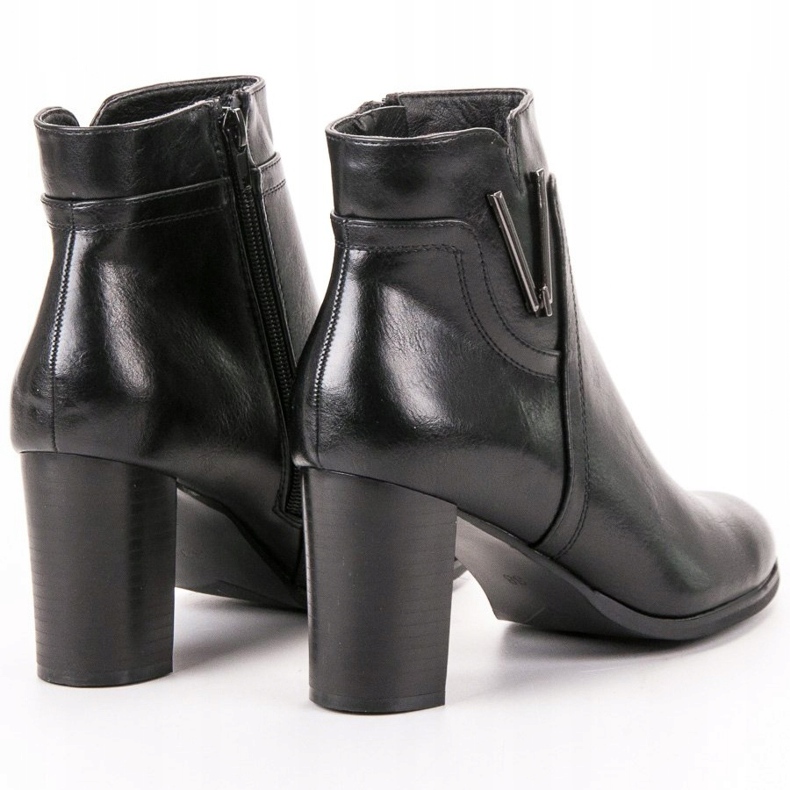 Vinceza Botas pretas em um poste preto 2