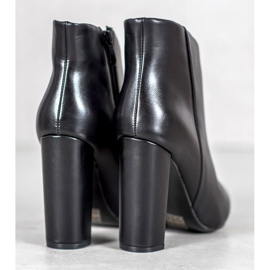 Seastar Botas elegantes em uma postagem preto 1