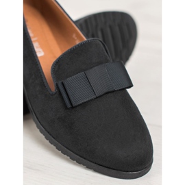 Miss Laura Senhores Com Um Arco preto 1 Miss Laura Senhores Com Um Arco preto 1