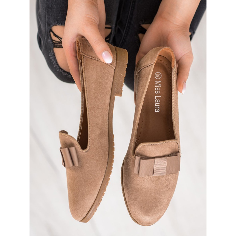 Miss Laura Senhores Com Um Arco marrom 1