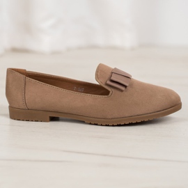 Miss Laura Senhores Com Um Arco castanho 2 Miss Laura Senhores Com Um Arco castanho 2