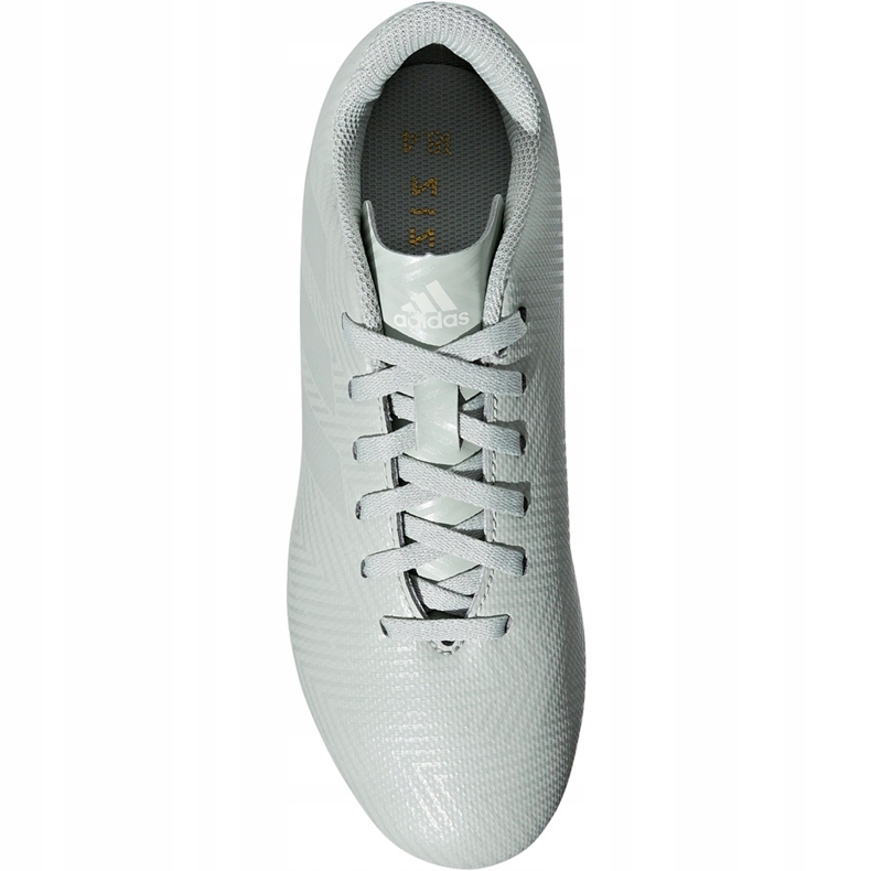 As chuteiras adidas Nemeziz 18.4 FxG Jr DB2356 multicolorido cinza 1