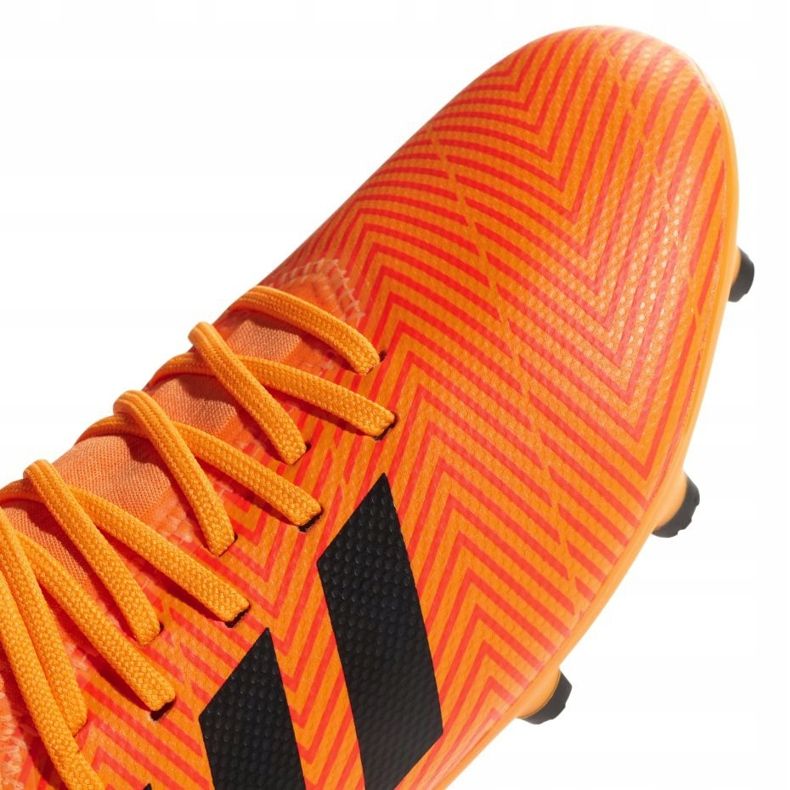 As chuteiras adidas Nemeziz 18.3 Fg Jr DB2352 multicolorido laranja 1