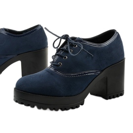 Botas de tornozelo azul marinho amarradas em um bloco Clearfall 1 Botas de tornozelo azul marinho amarradas em um bloco Clearfall 1