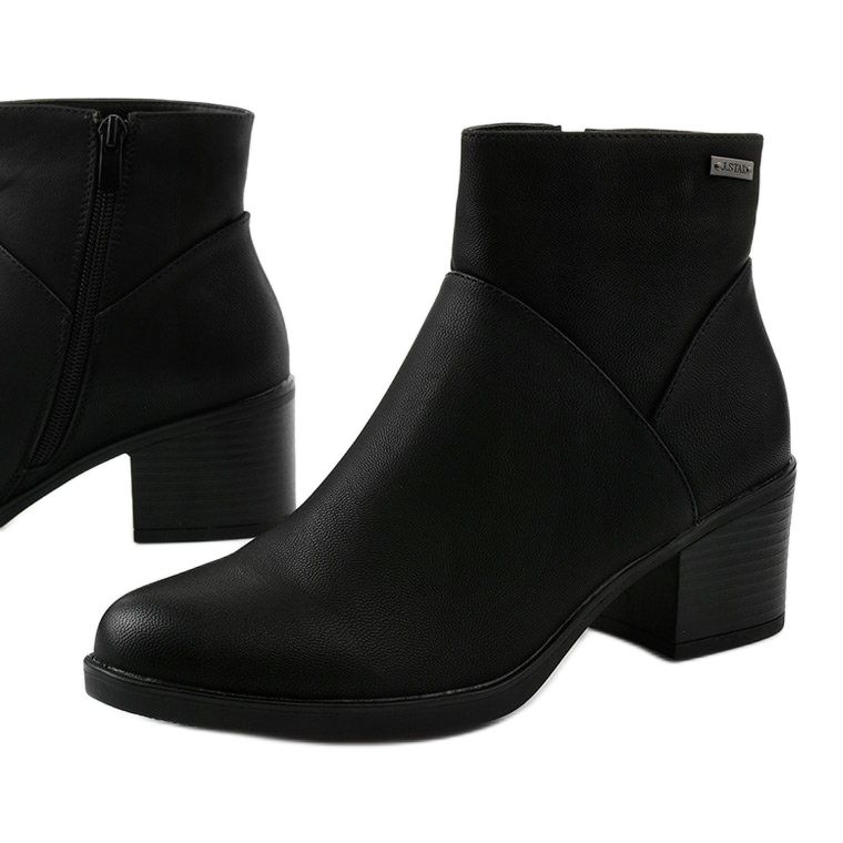 Botas pretas isoladas com zíper Suncutter preto 1 Botas pretas isoladas com zíper Suncutter preto 1