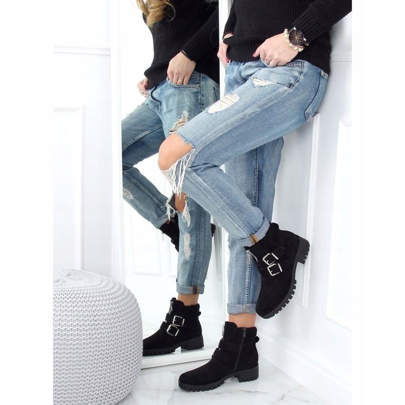 Botas pretas XJ-30 pretas no protetor preto 1