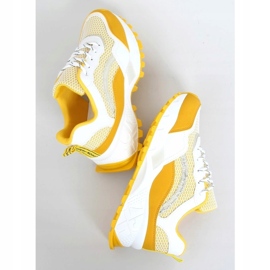 Sapatos esportivos amarelos e brancos 2008 1