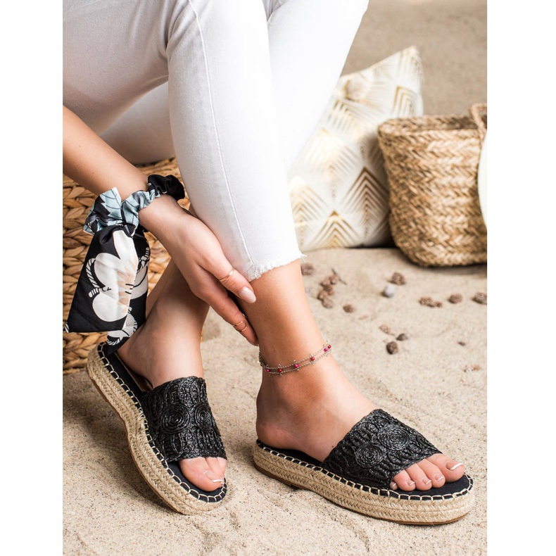 Seastar Alpercatas flip-flops em uma plataforma de palha preto 1