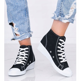 Tênis preto de cano alto na cunha da Marinha 1