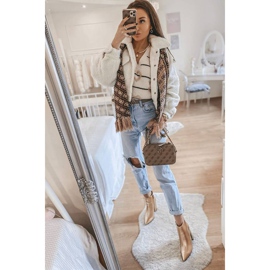 Botas douradas no poste Stomp dourado 1 Botas douradas no poste Stomp dourado 1