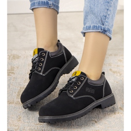 Sapatos pretos com sola grossa Pelland 2