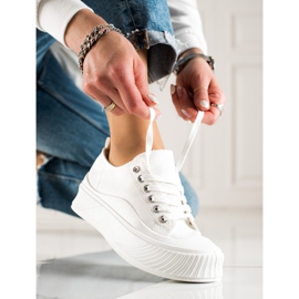 Seastar Tênis brancos na plataforma 1