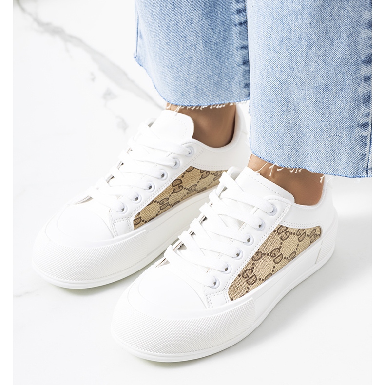 Tênis branco e marrom na plataforma Birkett 1