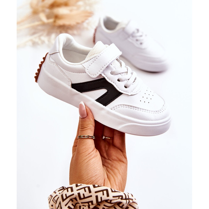 Tênis esportivo baixo de couro infantil preto e branco Jessie 1