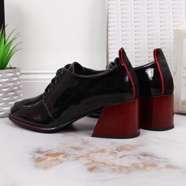 Sapatos femininos de couro em um bloco preto Filippo 5