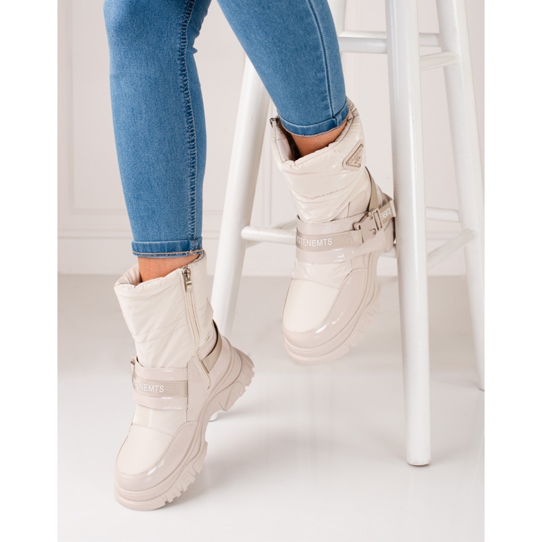 Botas de neve shelovet femininas isoladas com pele bege 2