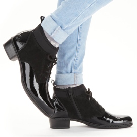 Botas de mulher lacadas em couro preto com isolamento Rieker Y0740-00 2
