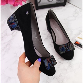 Sapatos pretos com laço decorativo de Sergio Leone 2